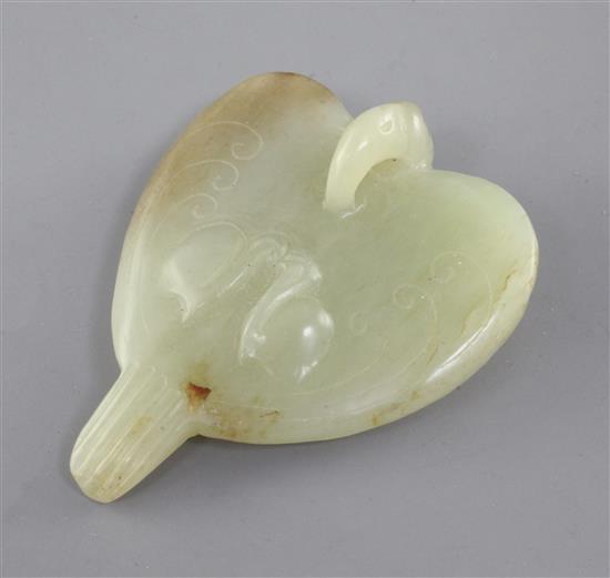 A Chinese yellow and russet jade carving of a falcon, Eastern Zhou dynasty or later, 7.7cm